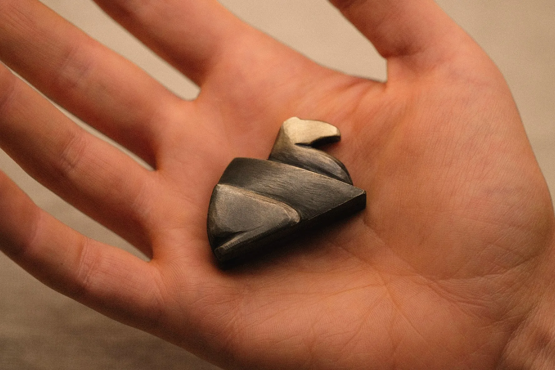 Zuma, held in the hand